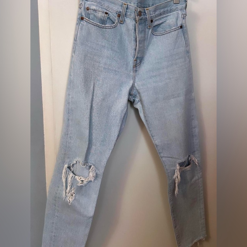 Levi denim jeans, raw hem at the bottom size 27